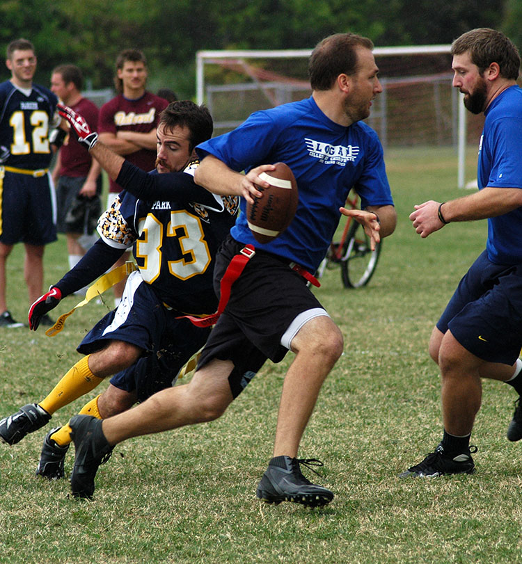 Students playing flag football.