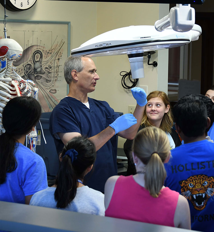Instructor teaching in the cadaver lab.