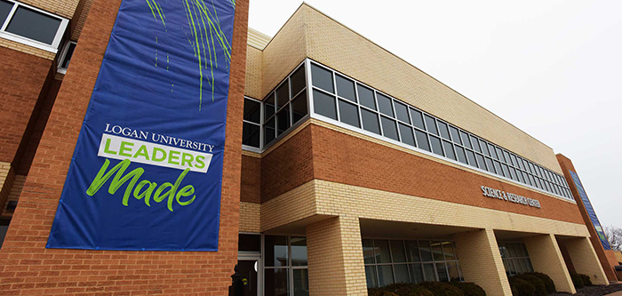 Outside building with new 领导人 banners hanging.