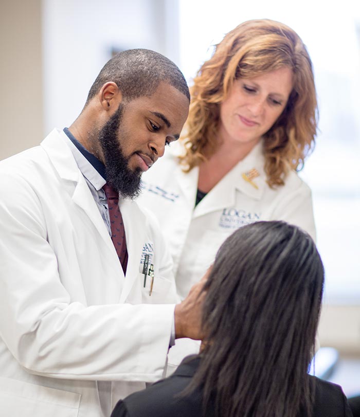 Instructor working with student.