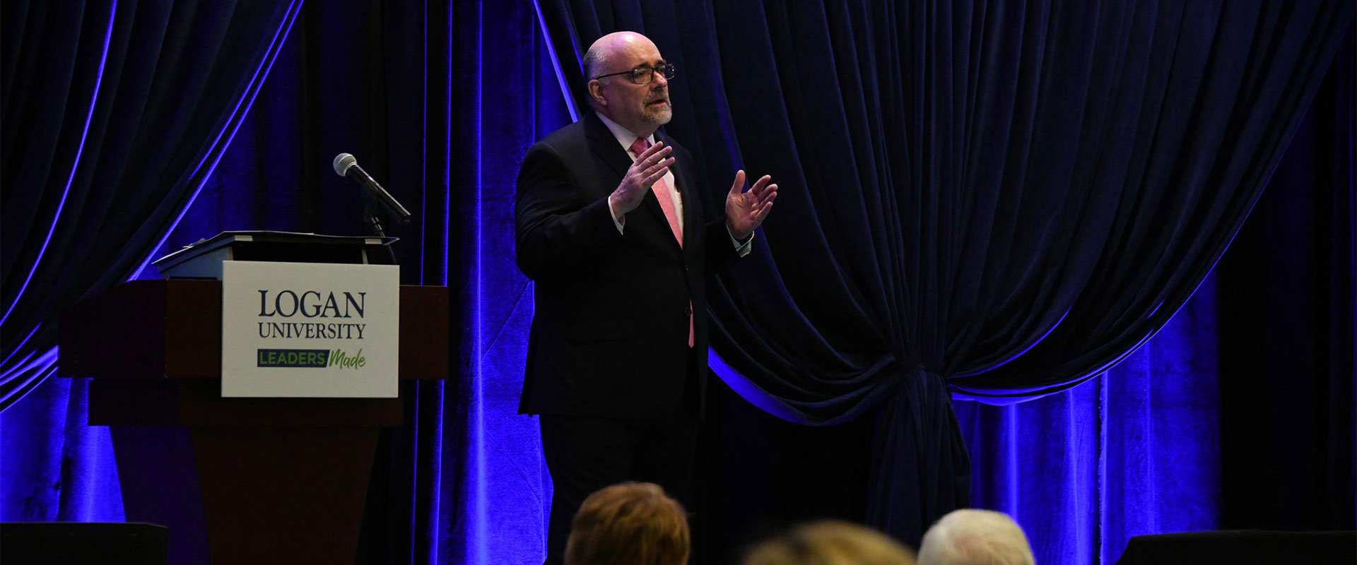 Dr. McDonald speaking at Spring Symposium.