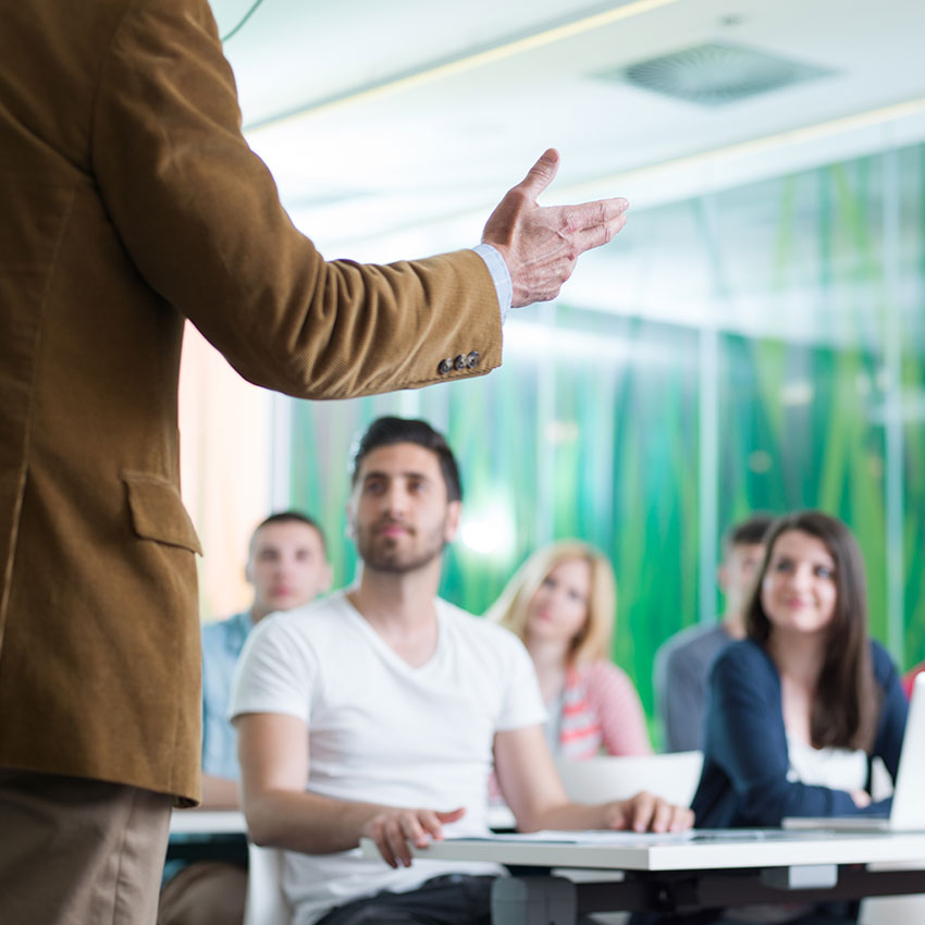 Teacher talking to his class.