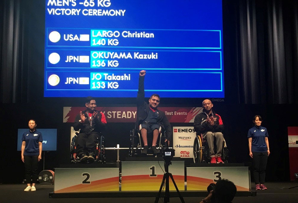 USAPP athlete celebrating gold medal win.