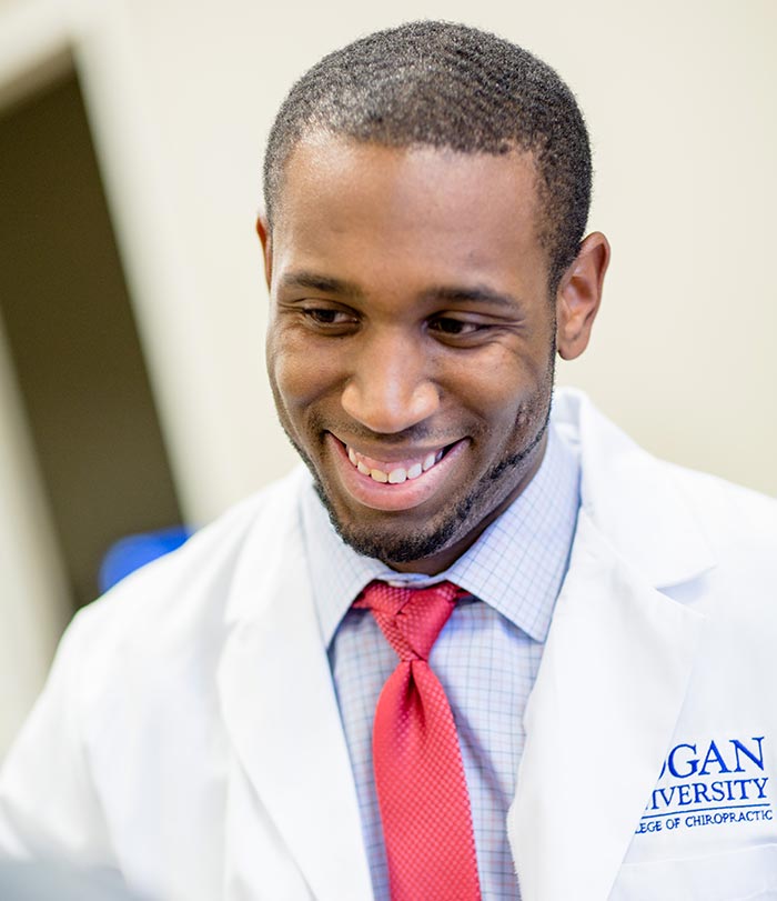 Male student smiling.